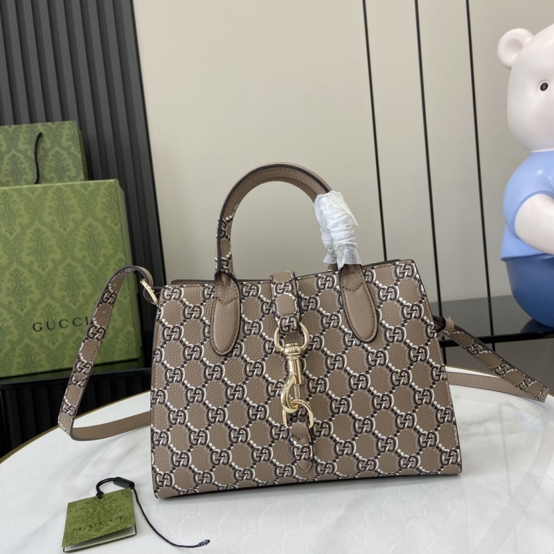 G*u*i top handle bags